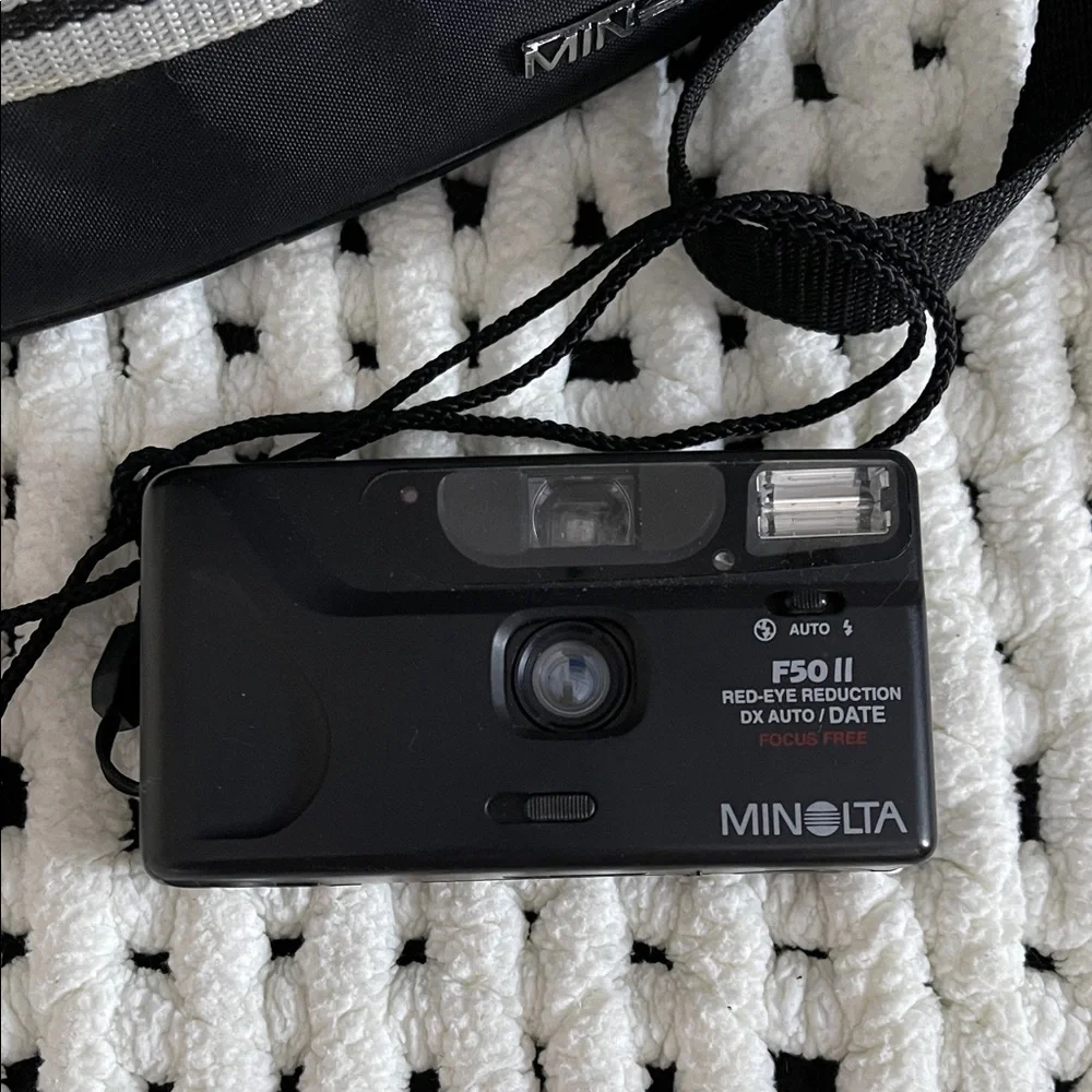 Minolta F50 II Black Camera,case, lense tissue. 1970’s. EUC. Not tested.